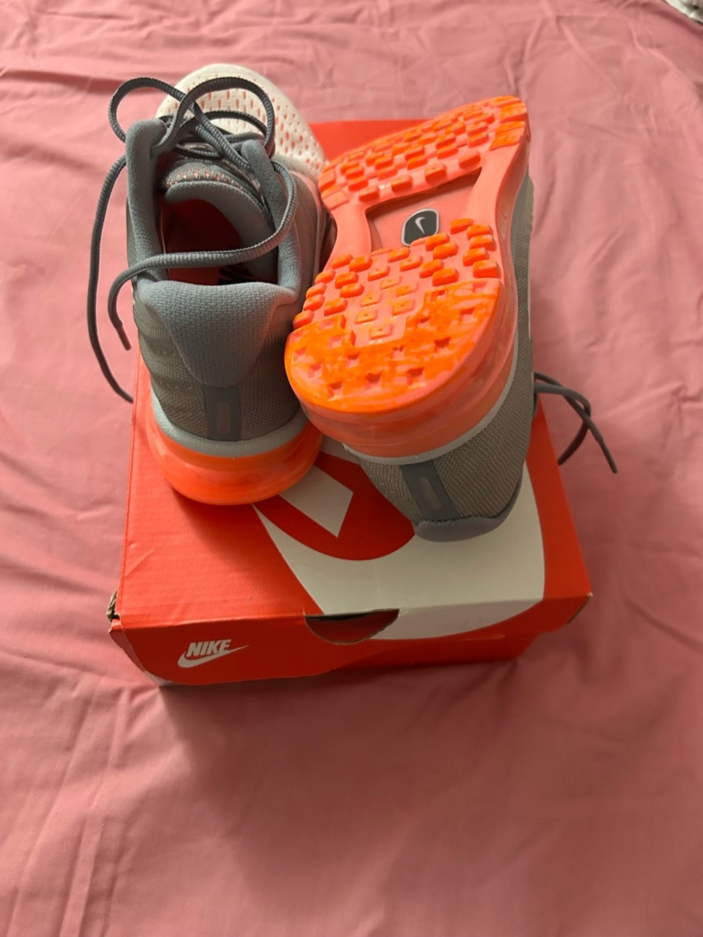 Nike women’s Gray Sneakers with orange and white